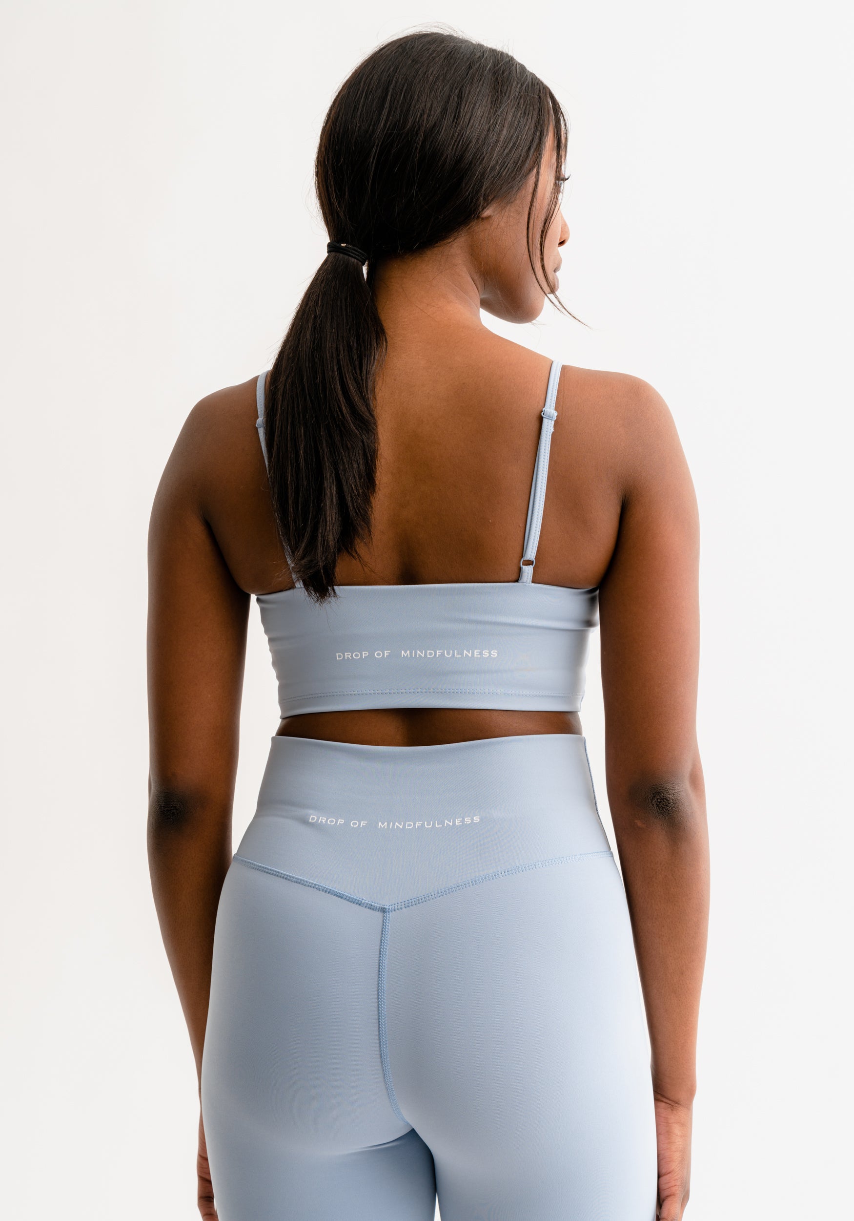 Rhode Sports Bra Wrapped Over Powder Blue