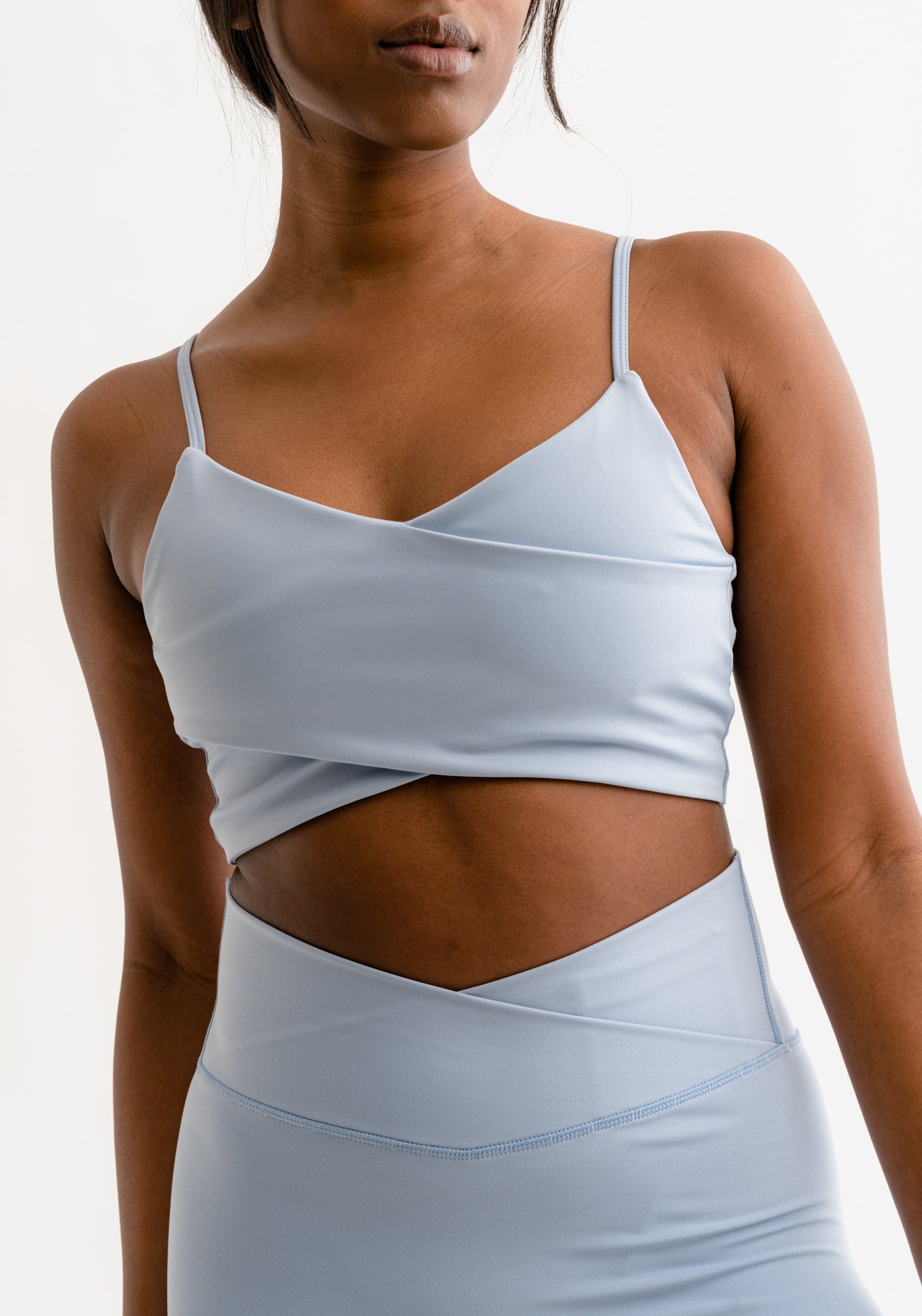 Rhode Sports Bra Wrapped Over Powder Blue