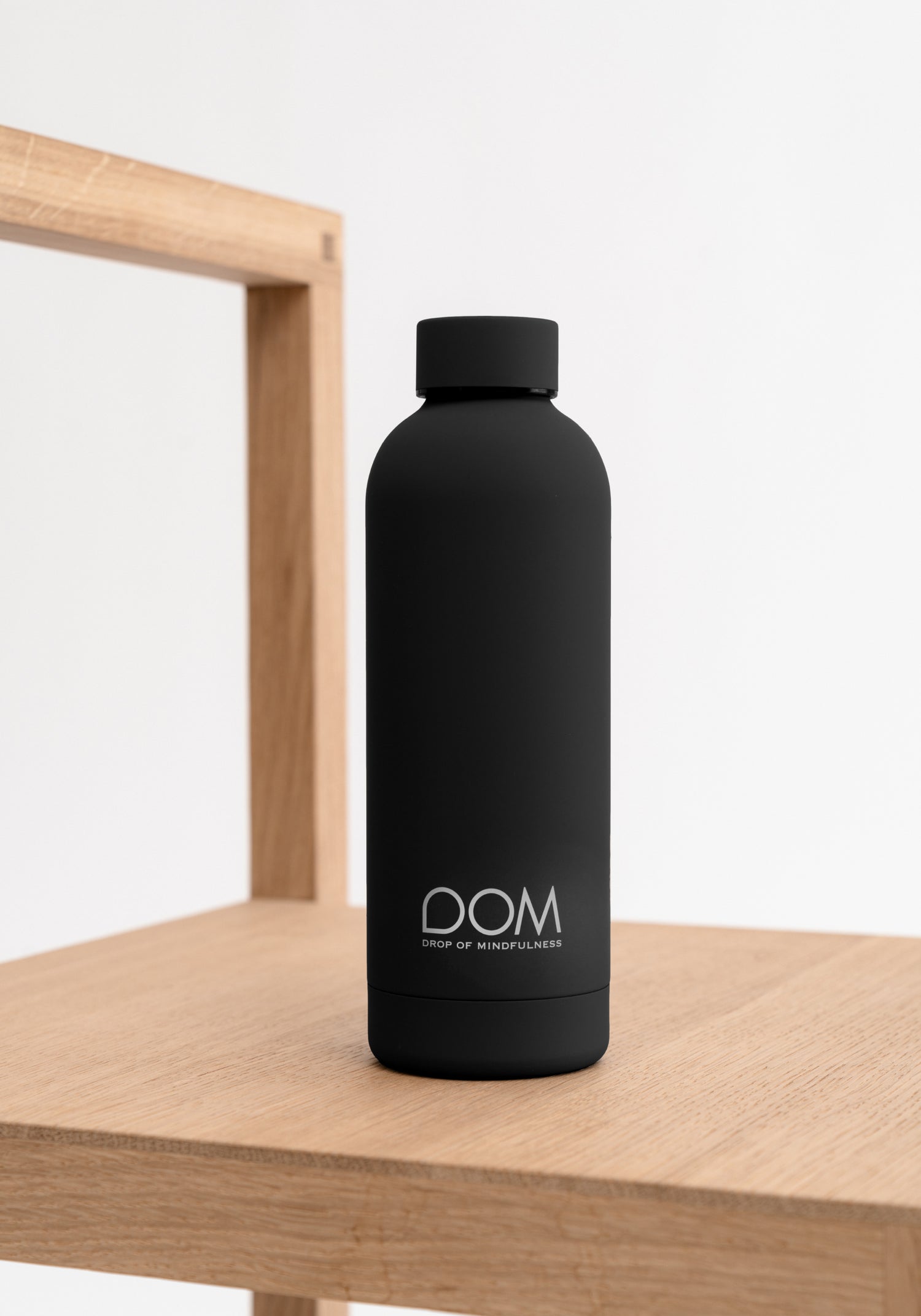 DOM Stylish black water bottle that keeps cold and warm – Drop